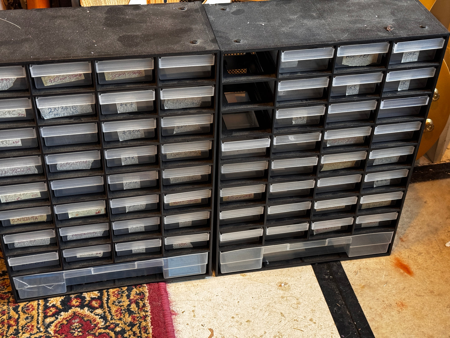 Pair of parts drawers, three missing drawers and one has a split in the lower big drawer